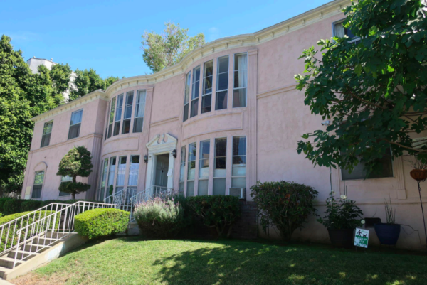 Two story exterior of American Colonial Revival apartment