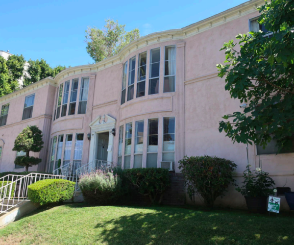 Two story exterior of American Colonial Revival apartment